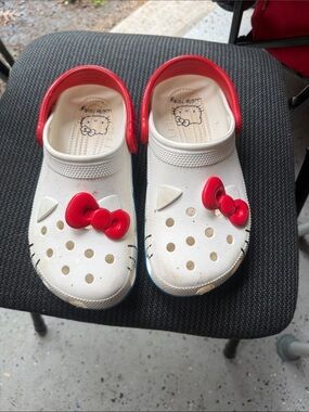 CROCS Kids White Clog Sandals with Red Bow Accent